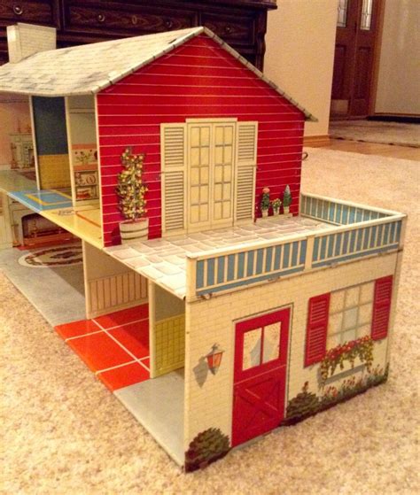 vintage metal two story doll house from 1950's|vintage tin doll houses 1950.